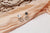 ARETES MINI CANOA FLOREADA PLATEADO